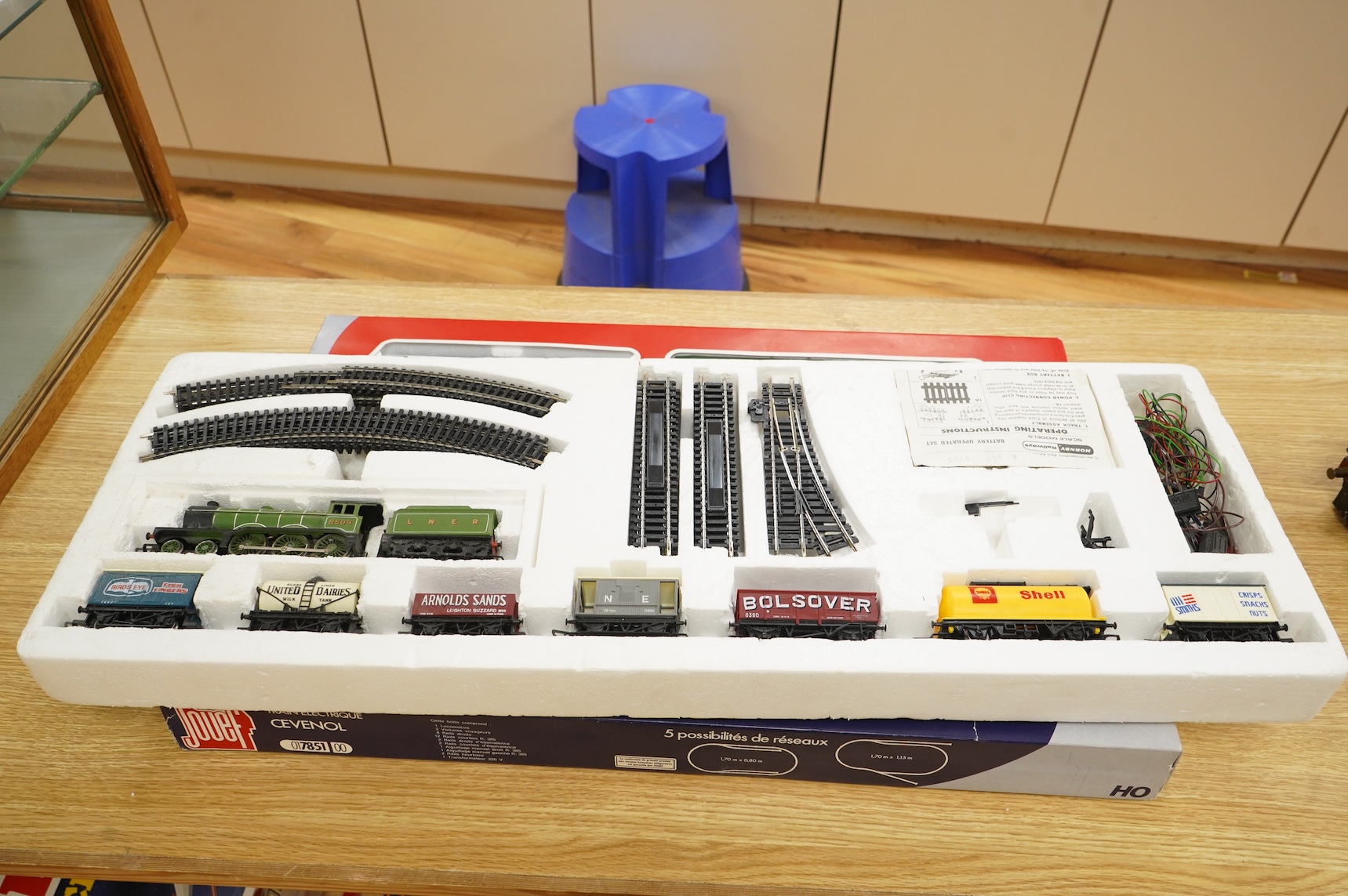 A collection of 00 gauge model railway, including three box train sets by Jouef, Mainline and Hornby, together with a large selection of unconstructed railway related plastic and metal kits and accessories, manufacturers